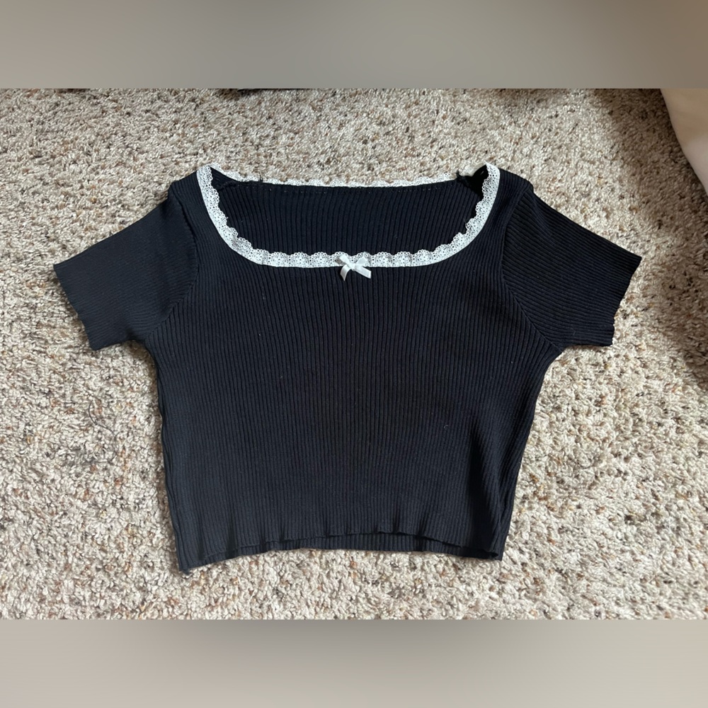 black scoop neck crop top with lace trim